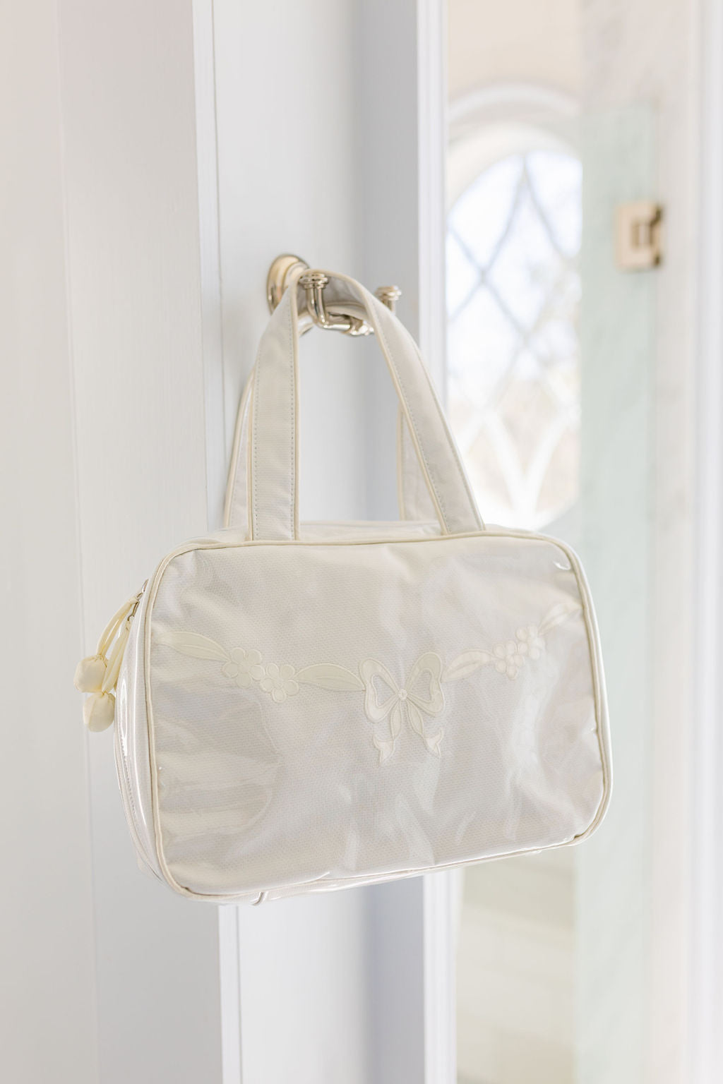 FLORAL BOW HANGING TRAVEL BAG - Lenora
