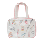 Embroidered essentials hanging travel bag with pink trim by Lenora