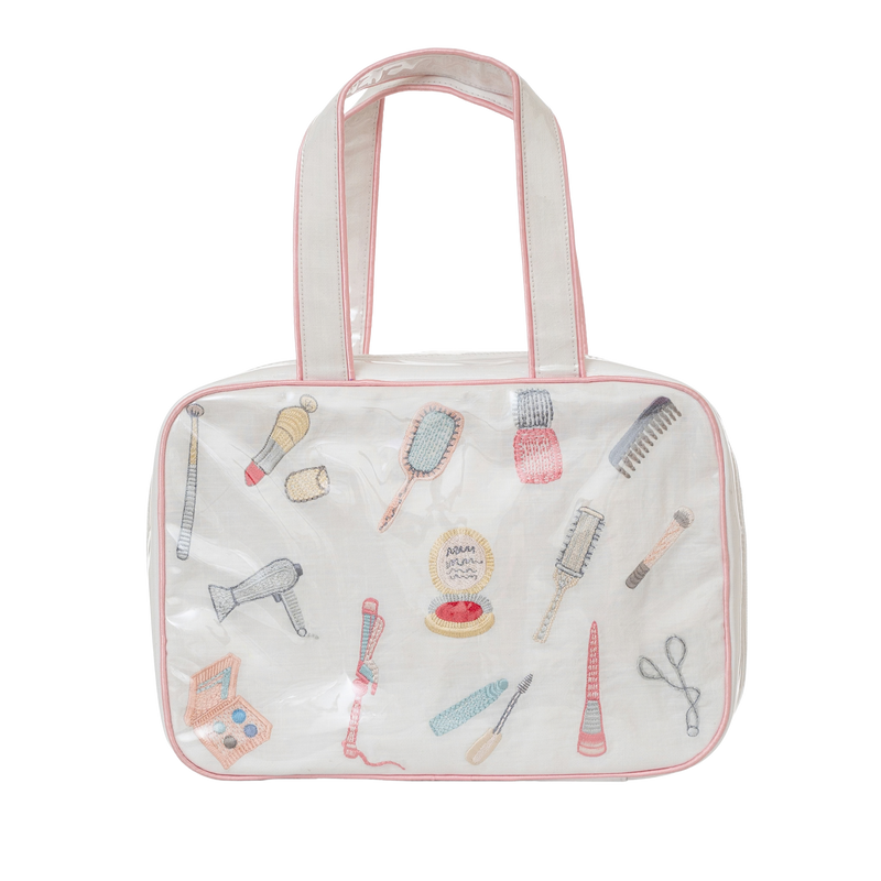 Embroidered essentials hanging travel bag with pink trim by Lenora