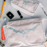 FLORAL BOW LARGE MAKEUP BAG - Lenora