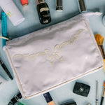 FLORAL BOW LARGE MAKEUP BAG - Lenora