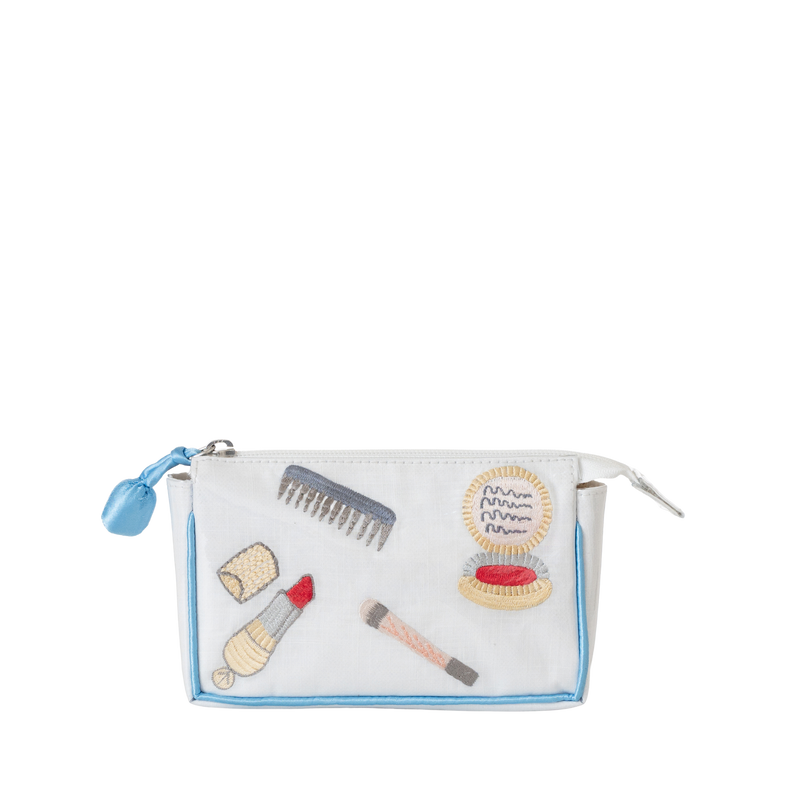 Embroidered essentials mini makeup bag with blue trim by Lenora